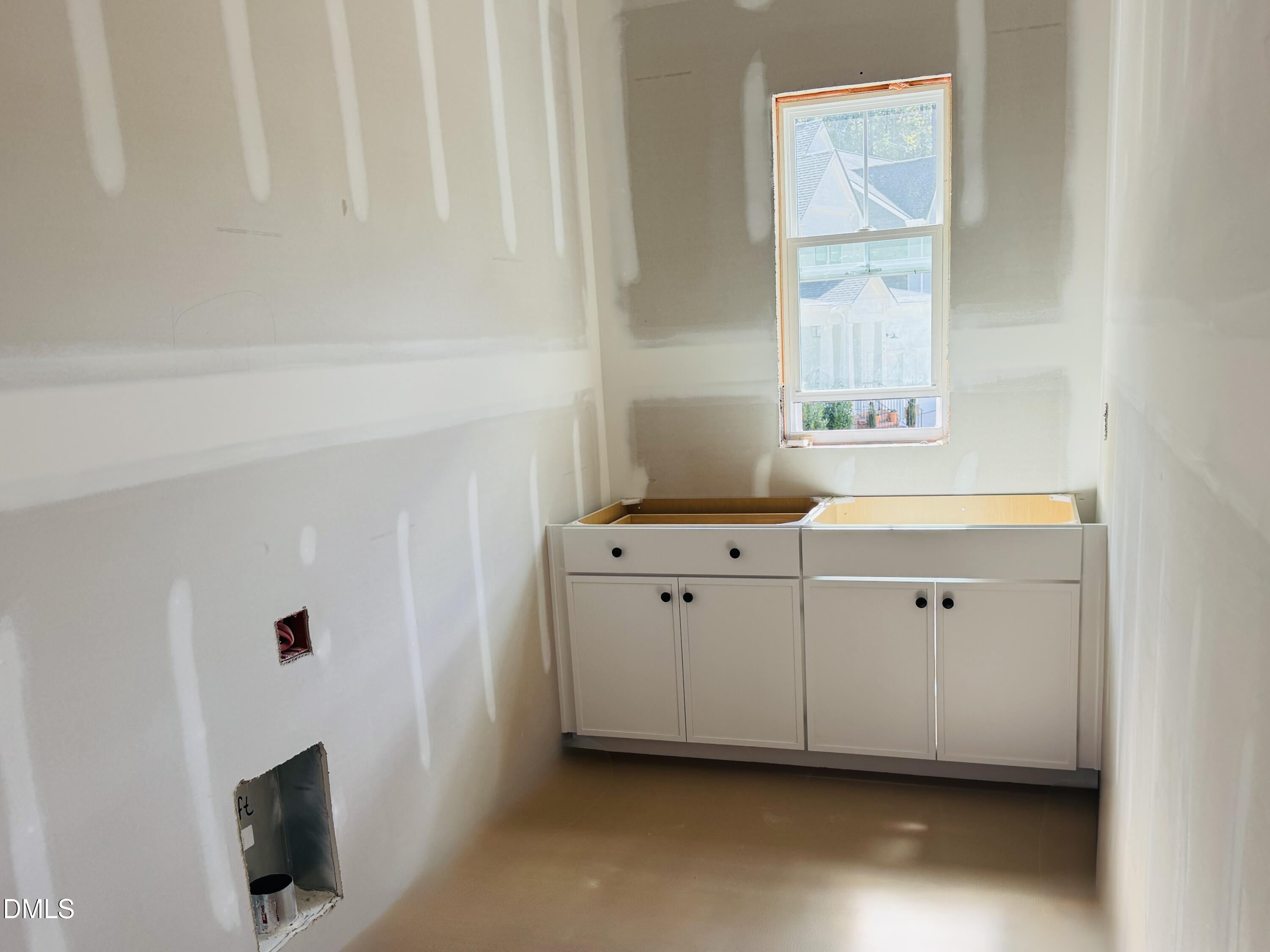 2710 Pathway Drive Chapel Hill, NC 27516 - Photo 8 of 17 a view of cabinets with wooden floor