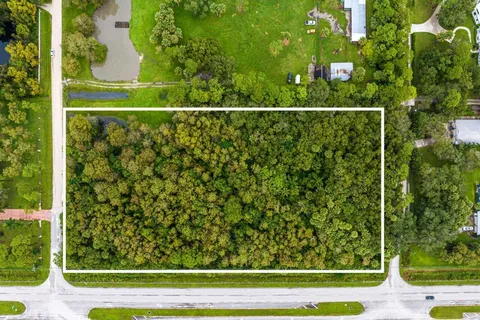 a view of a yard with an outdoor space