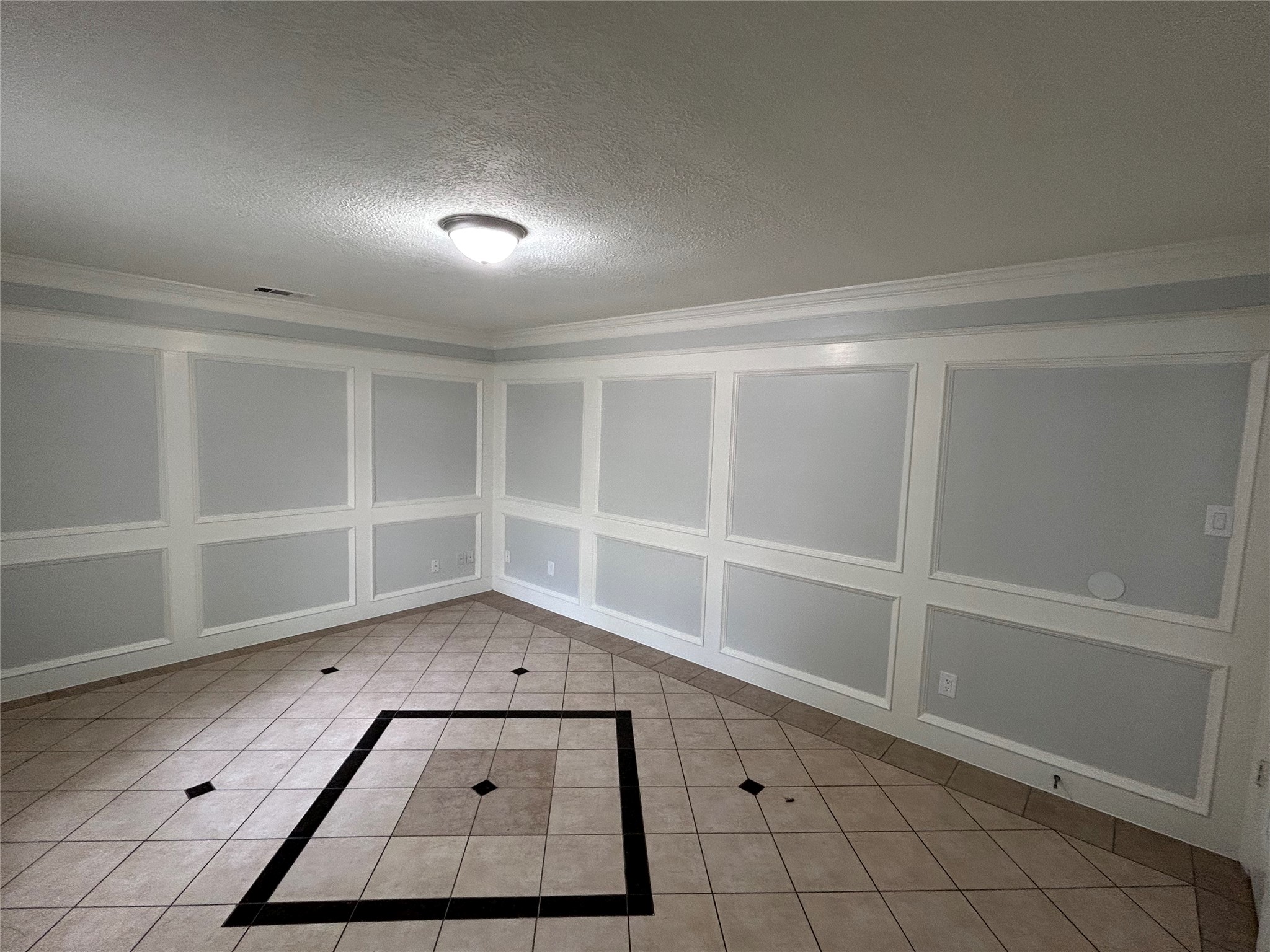 706 Houghton Road Katy, TX 77450 - Photo 6 of 14 a view of an empty room with a window
