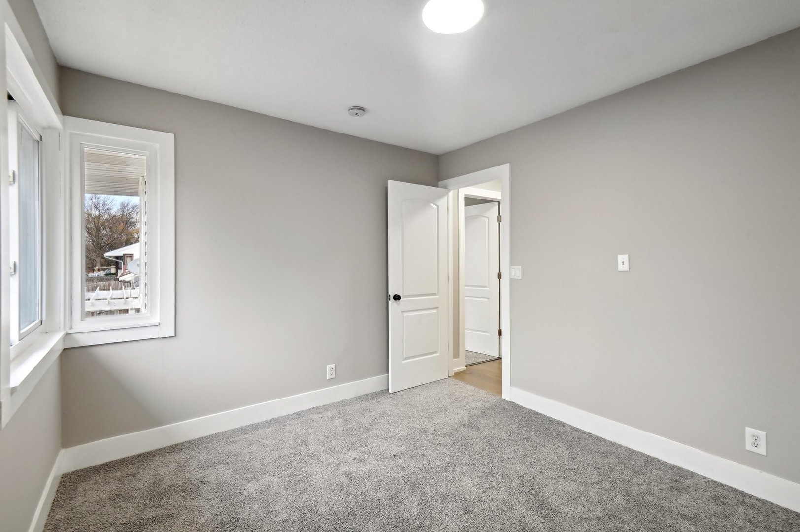 110 Elmwood Road Romeoville, IL 60446 - Photo 14 of 33 a view of an empty room with a window