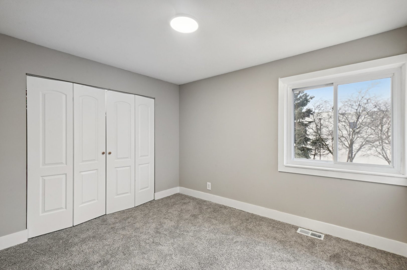 110 Elmwood Road Romeoville, IL 60446 - Photo 15 of 33 an empty room with windows