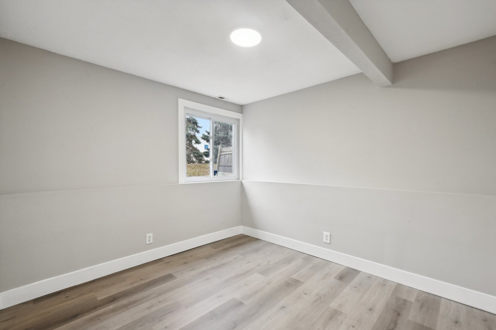 110 Elmwood Road Romeoville, IL 60446 - Photo 24 of 33 wooden floor in an empty room with a window