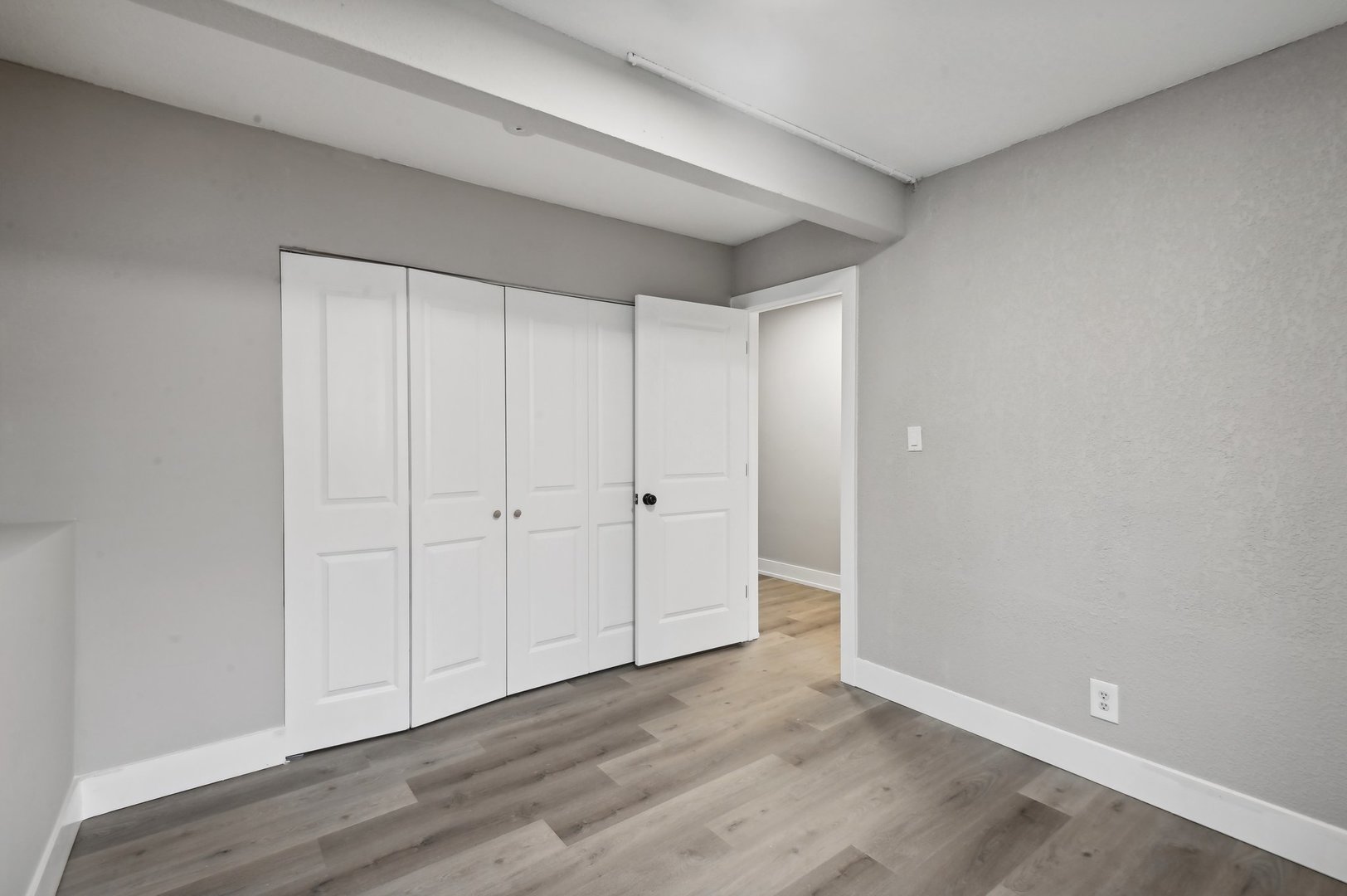 110 Elmwood Road Romeoville, IL 60446 - Photo 25 of 33 a view of an empty room and wooden floor