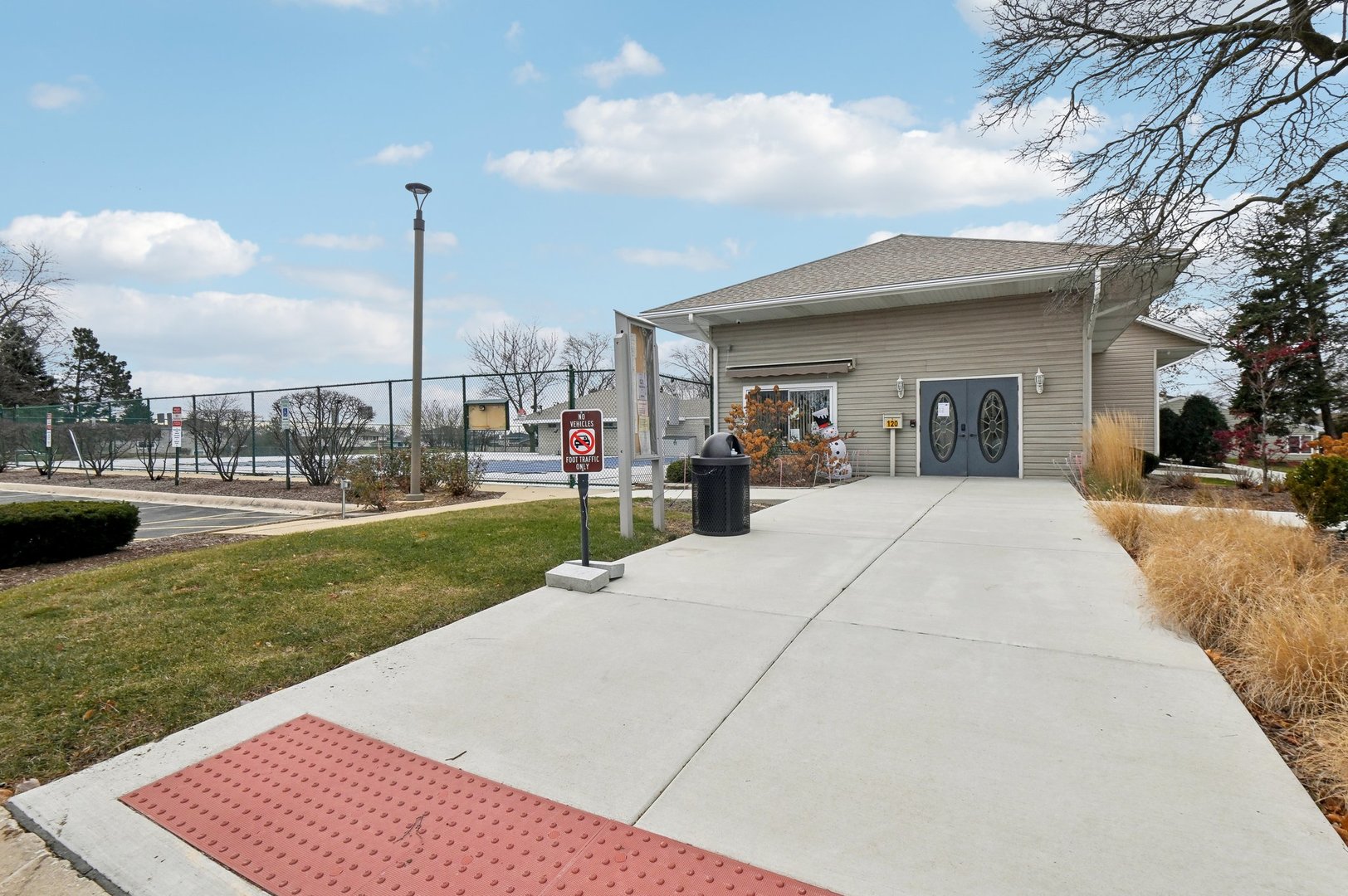 110 Elmwood Road Romeoville, IL 60446 - Photo 30 of 33 a view of a patio with a table and chairs