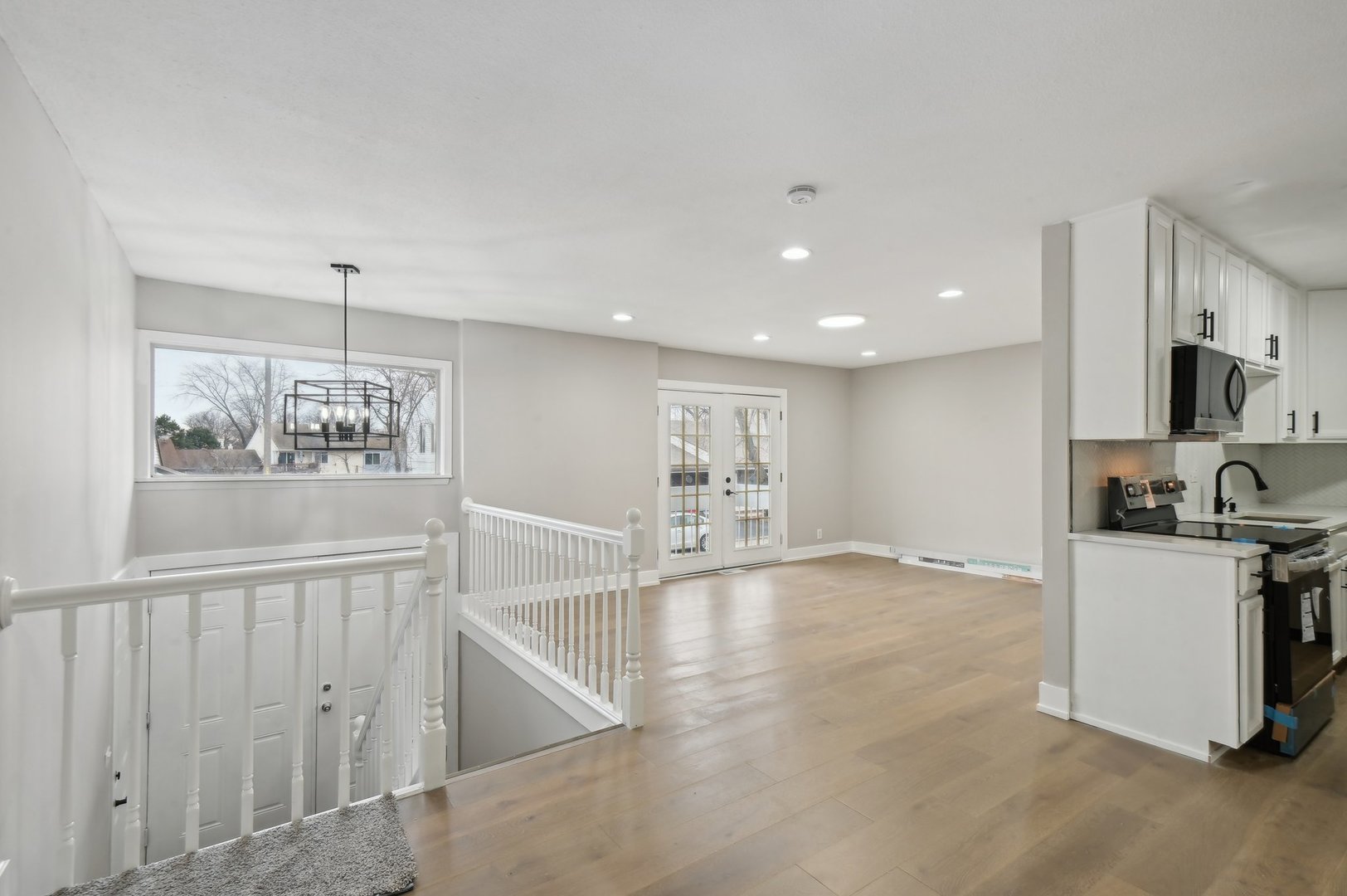 110 Elmwood Road Romeoville, IL 60446 - Photo 8 of 33 a view of a kitchen with a sink a refrigerator and window