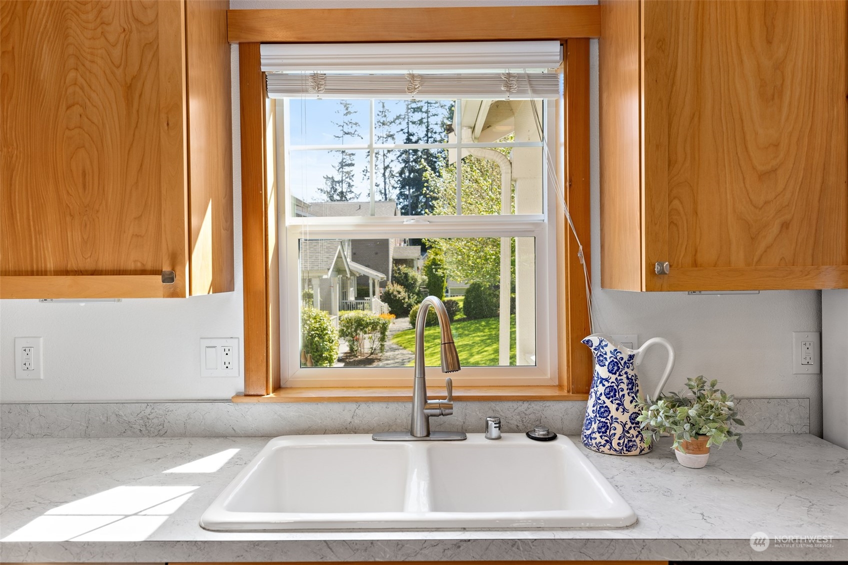 1322 Polly's Lane Bainbridge Island, WA 98110 - Photo 13 of 30 a bathroom with a window sink and mirror