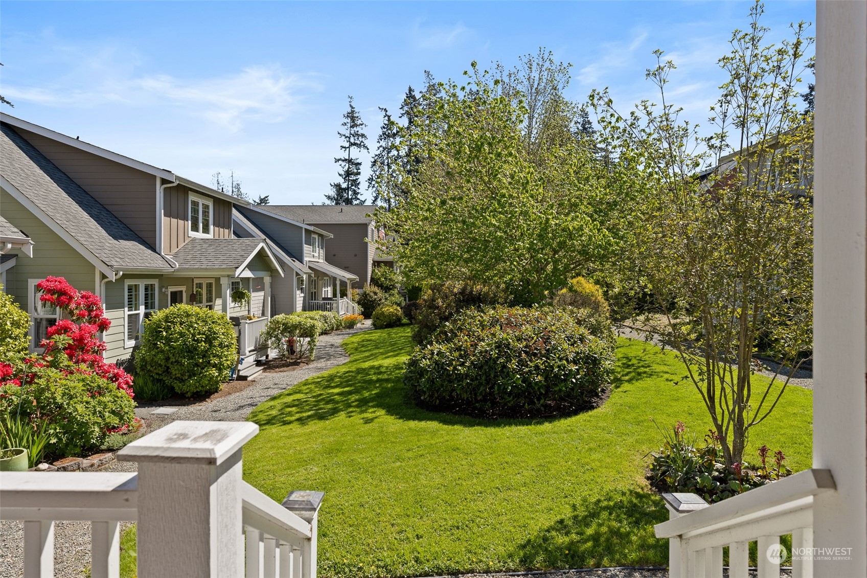 1322 Polly's Lane Bainbridge Island, WA 98110 - Photo 16 of 30 a front view of a house with garden