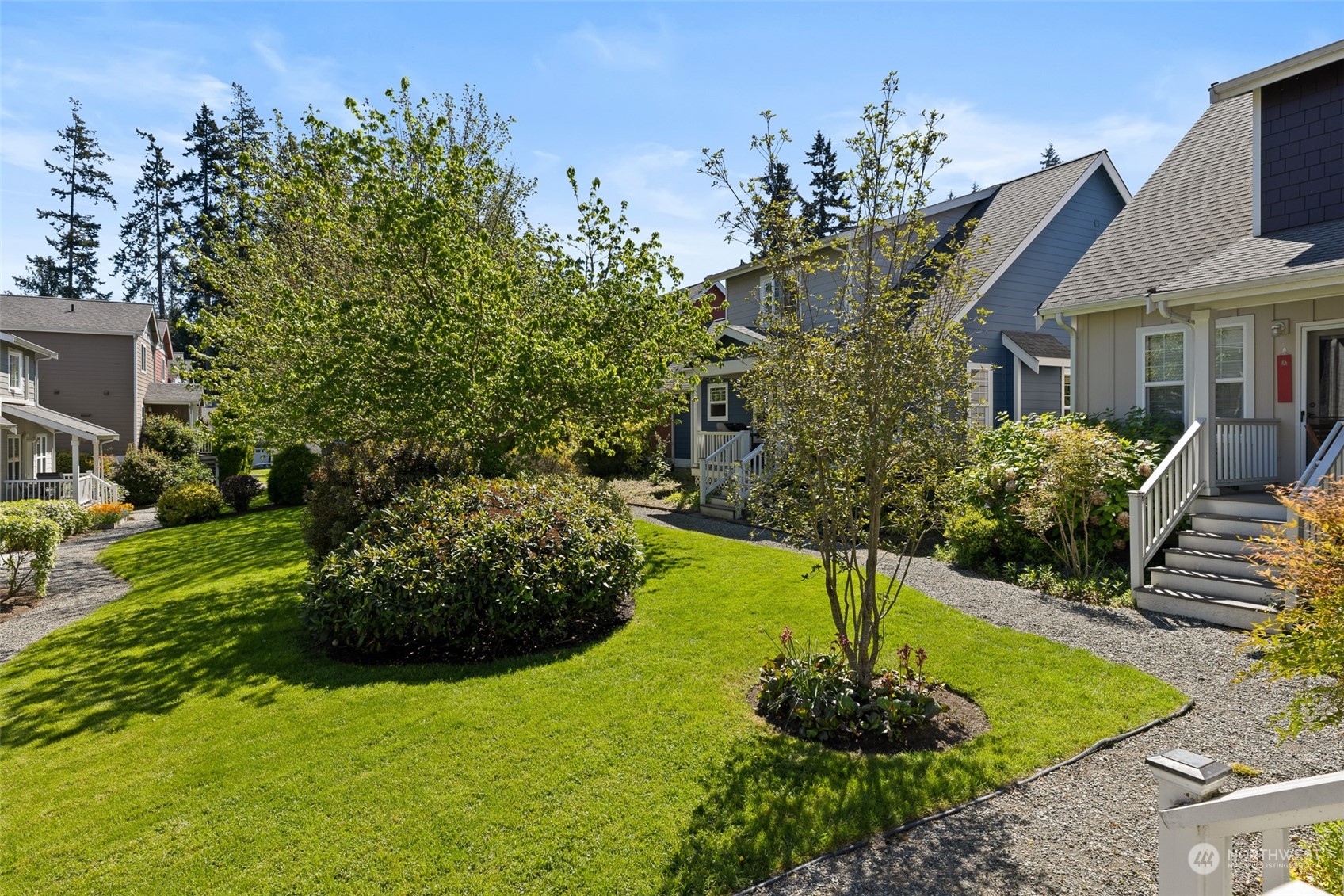 1322 Polly's Lane Bainbridge Island, WA 98110 - Photo 18 of 30 a front view of a house with a yard