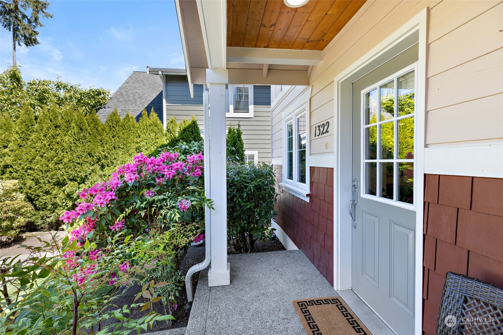 1322 Polly's Lane Bainbridge Island, WA 98110 - Photo 2 of 30 a view of a house with potted plants