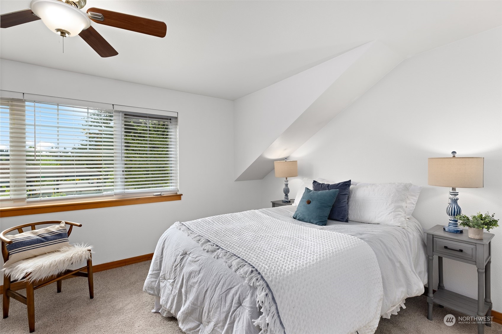 1322 Polly's Lane Bainbridge Island, WA 98110 - Photo 21 of 30 a bedroom with a bed and a window