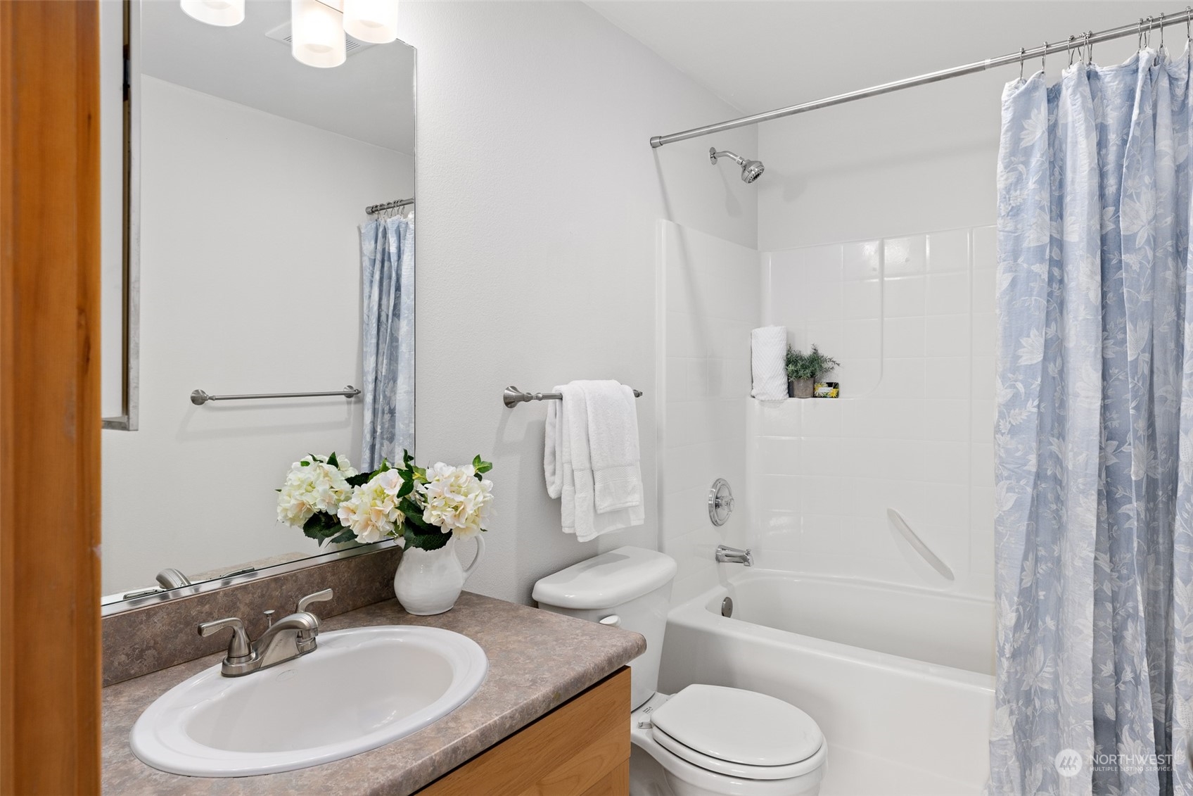 1322 Polly's Lane Bainbridge Island, WA 98110 - Photo 23 of 30 a bathroom with a sink toilet and shower