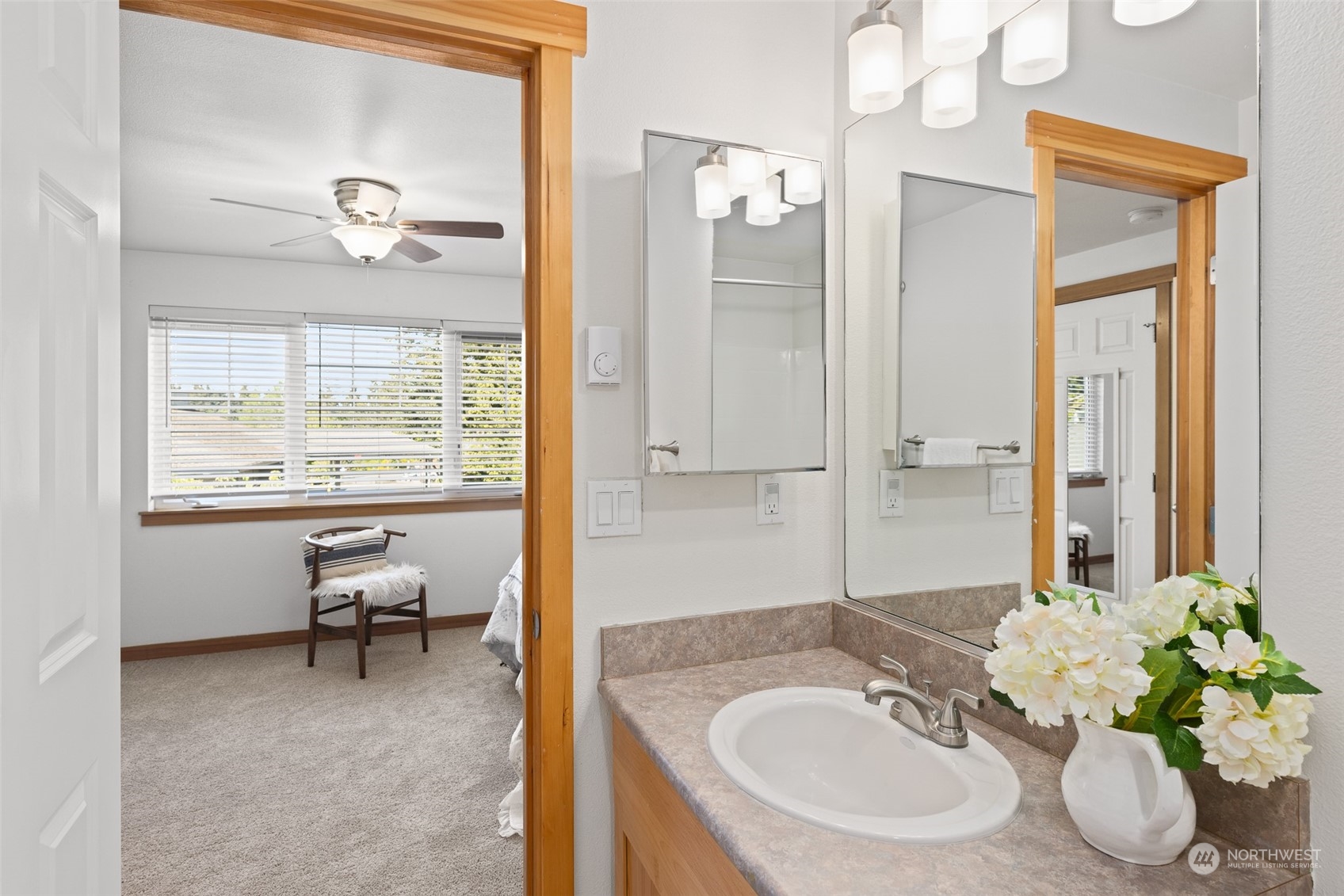 1322 Polly's Lane Bainbridge Island, WA 98110 - Photo 24 of 30 a bathroom with a sink double vanity and a mirror