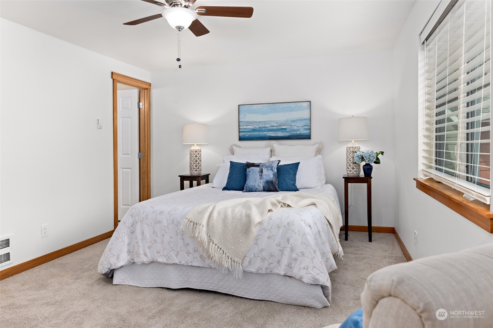 1322 Polly's Lane Bainbridge Island, WA 98110 - Photo 26 of 30 a bedroom with bed and a painting on the wall