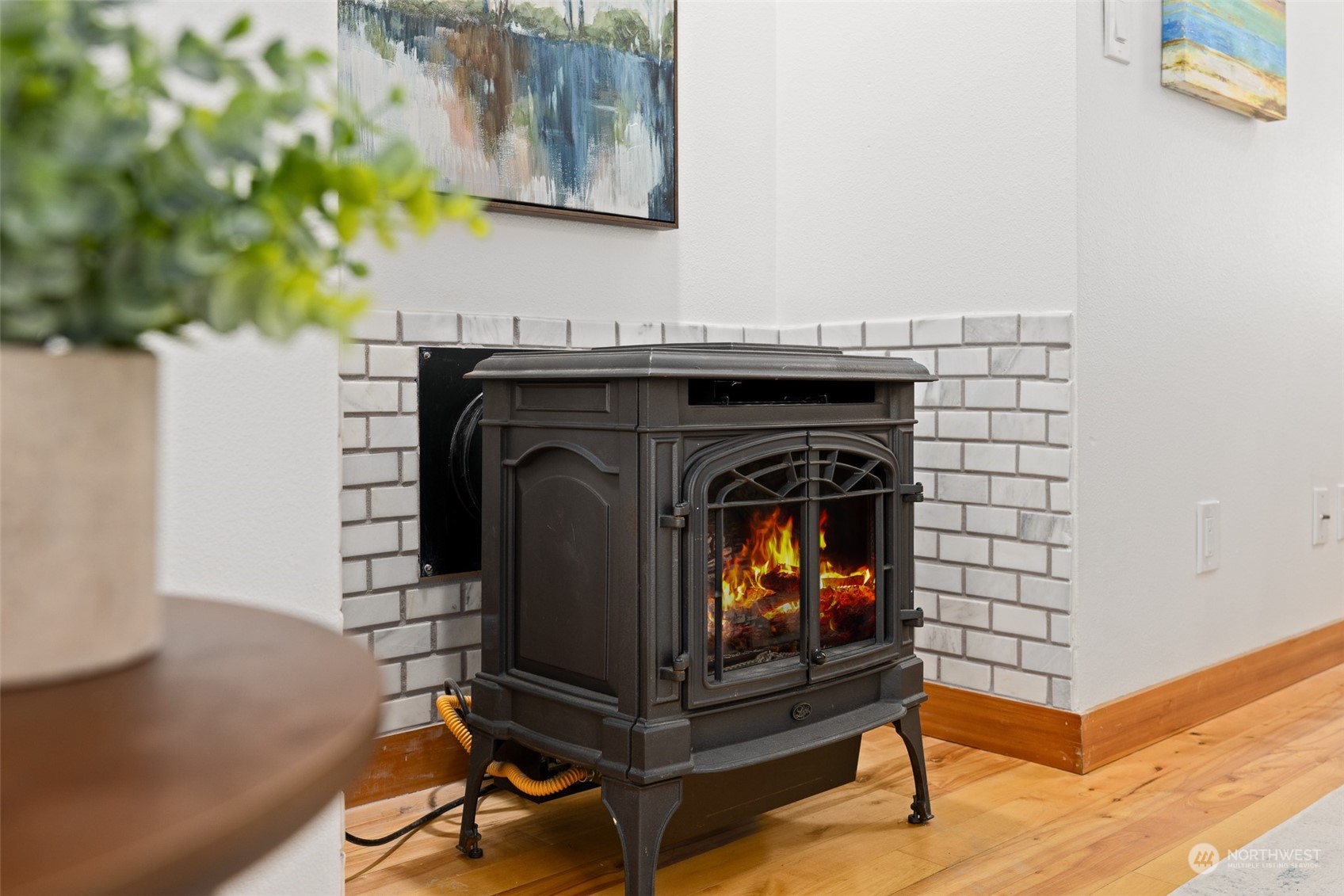 1322 Polly's Lane Bainbridge Island, WA 98110 - Photo 7 of 30 a living room with furniture and a fireplace
