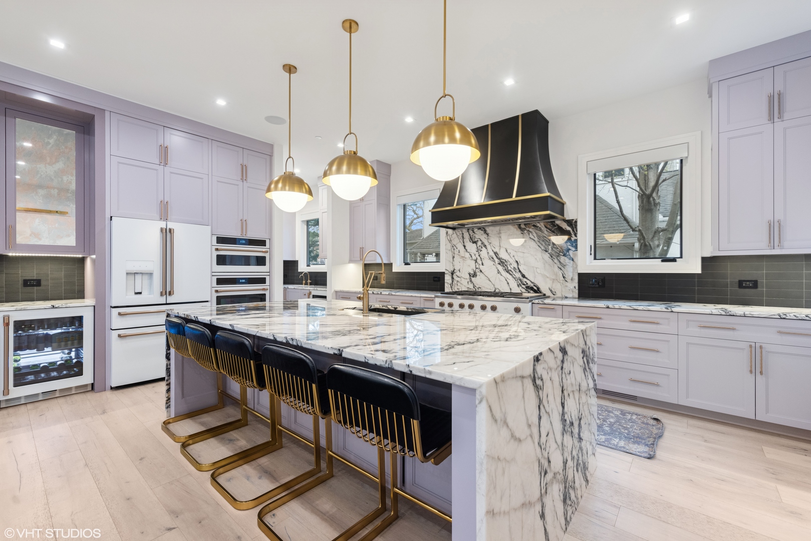 4320 Howard Avenue Western Springs, IL 60558 - Photo 8 of 20 a kitchen with kitchen island granite countertop a stove a sink a oven and a refrigerator