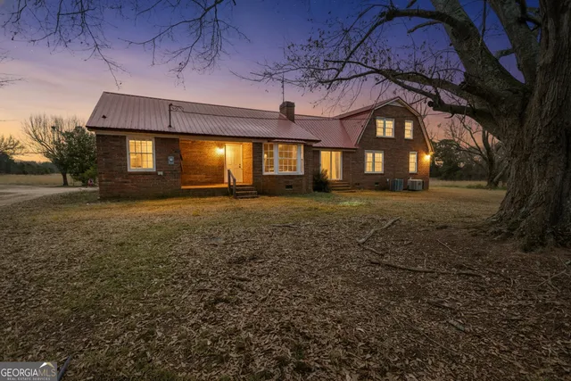 a view of a room with furniture window and wooden floor