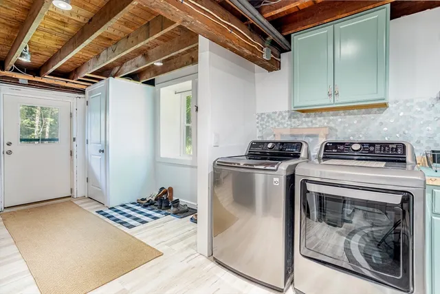 a kitchen with a stove and a refrigerator