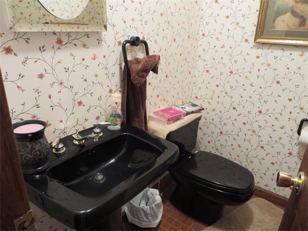 11 Modoc Heath, MA 01346 - Photo 19 of 21 a bathroom with a toilet a sink and a mirror