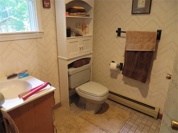 11 Modoc Heath, MA 01346 - Photo 20 of 21 a bathroom with a sink and a toilet