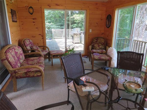 11 Modoc Heath, MA 01346 - Photo 6 of 21 a living room with furniture and a window