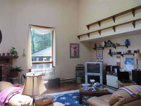 11 Modoc Heath, MA 01346 - Photo 10 of 21 a living room with furniture and a window
