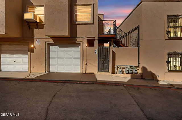 a view of a house with a street