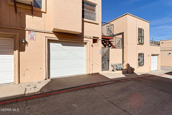 a view of a house with a street