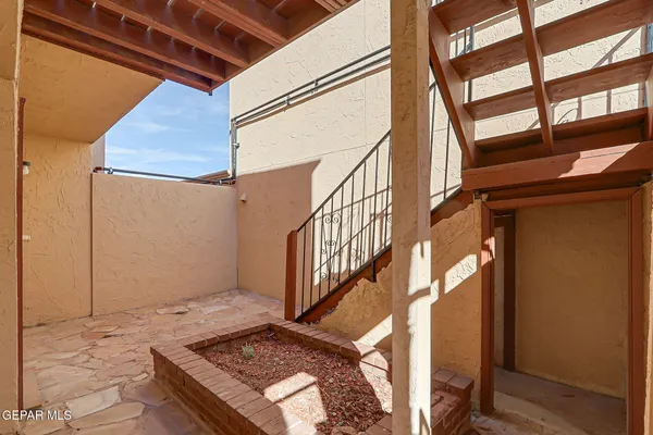 a view of staircase with a rug