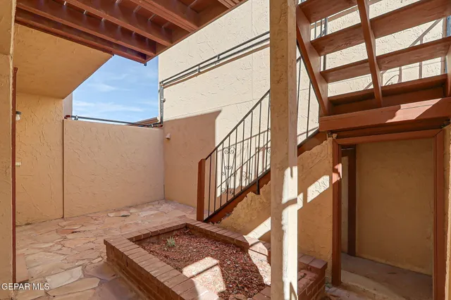 a view of staircase with a rug