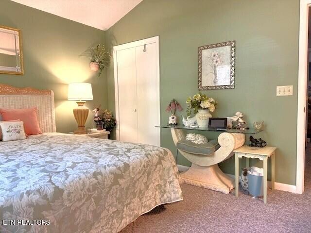 246 St George Drive Crossville, TN 38558 - Photo 16 of 25 a bedroom with a bed and a table in it