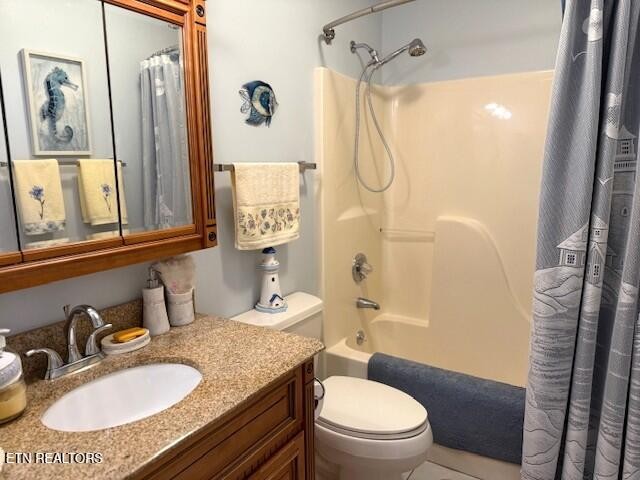 246 St George Drive Crossville, TN 38558 - Photo 17 of 25 a bathroom with a granite countertop sink toilet a mirror and shower