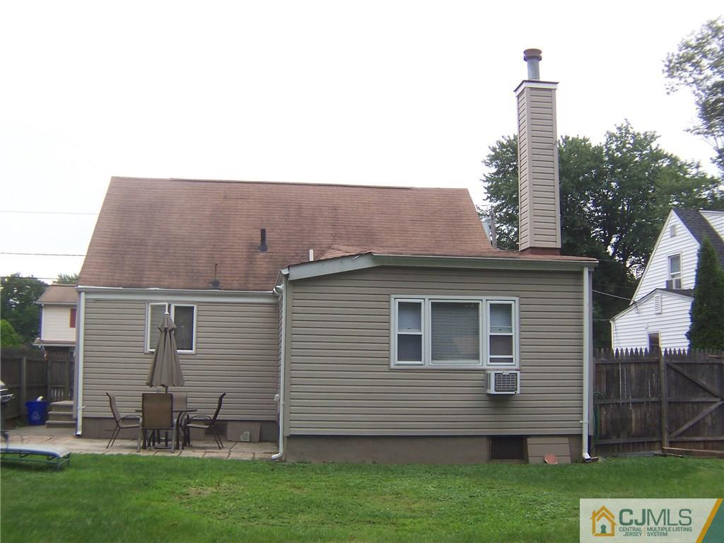 14 West Cliff Road Colonia, NJ 07067 - Photo 2 of 18 a view of a house with a yard
