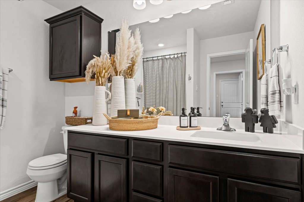 6326 Matagorda Road Belton, TX 76513 - Photo 11 of 14 a bathroom with a sink and a toilet