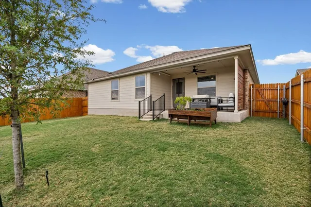 a house view with a garden space