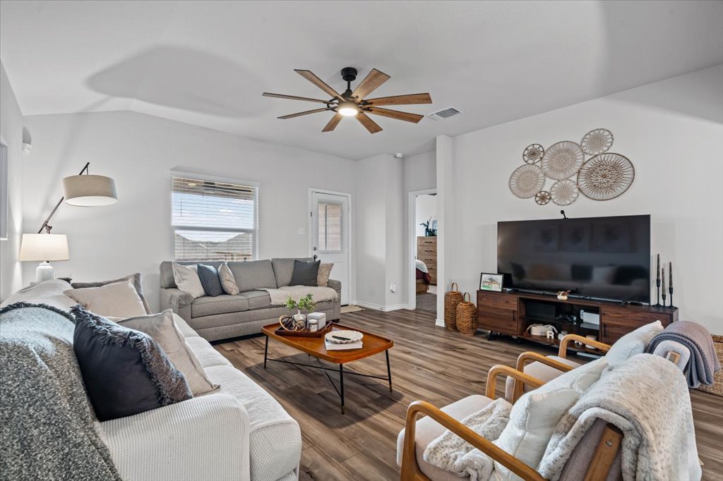 6326 Matagorda Road Belton, TX 76513 - Photo 2 of 14 a living room with furniture and a flat screen tv