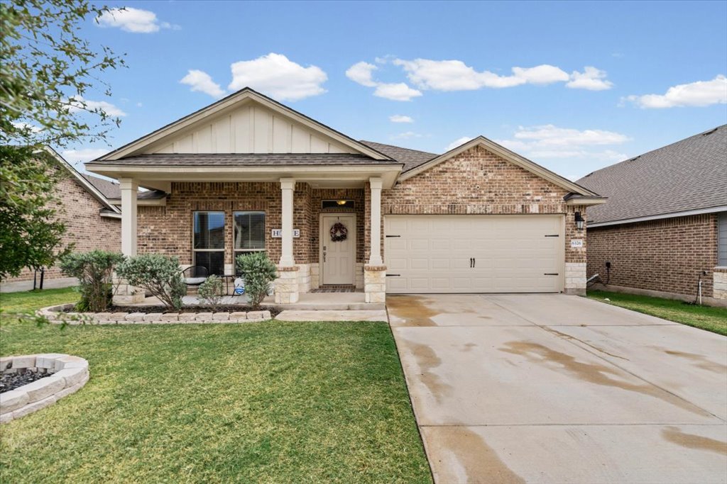 6326 Matagorda Road Belton, TX 76513 - Photo 4 of 14 a front view of a house with a yard and porch