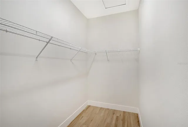 a view of a room with racks on the wall