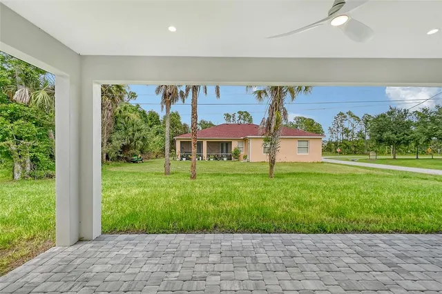 a view of a porch with a yard