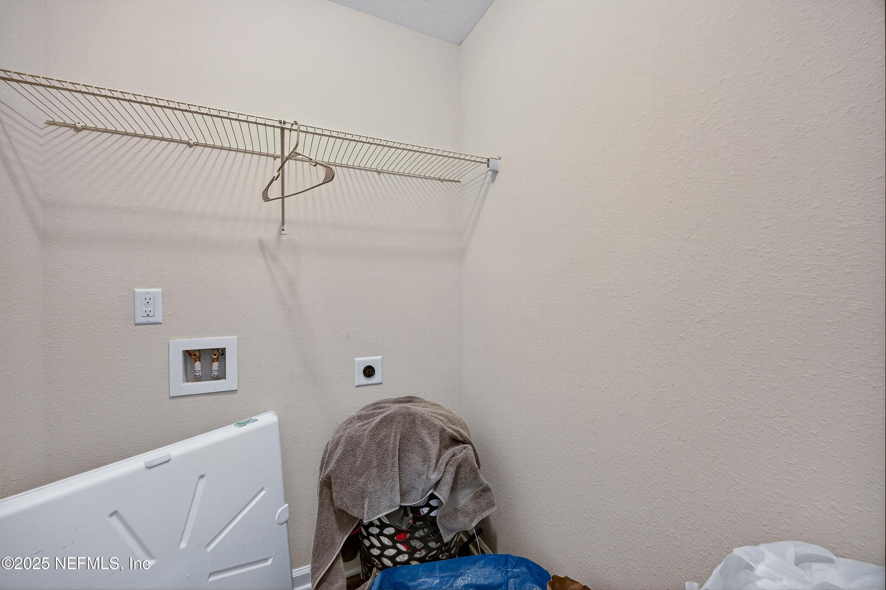 756 Talking Tree Drive Jacksonville, FL 32205 - Photo 21 of 26 a bathroom with a sink a toilet and shower