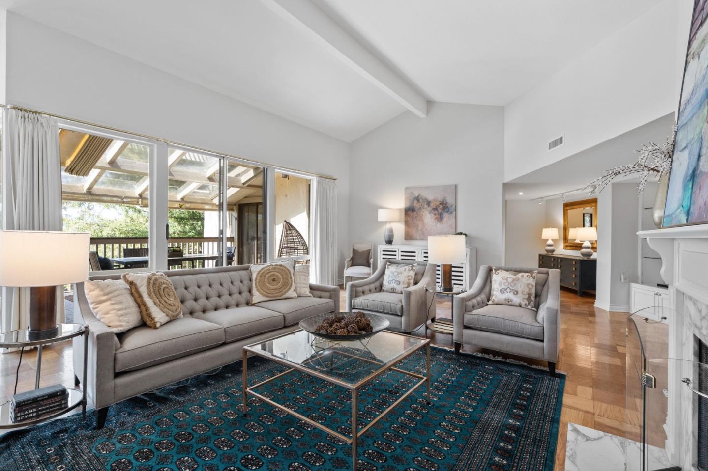 300 Sand Hill Circle, Unit 303 Menlo Park, CA 94025 - Photo 1 of 33 a living room with furniture and a floor to ceiling window