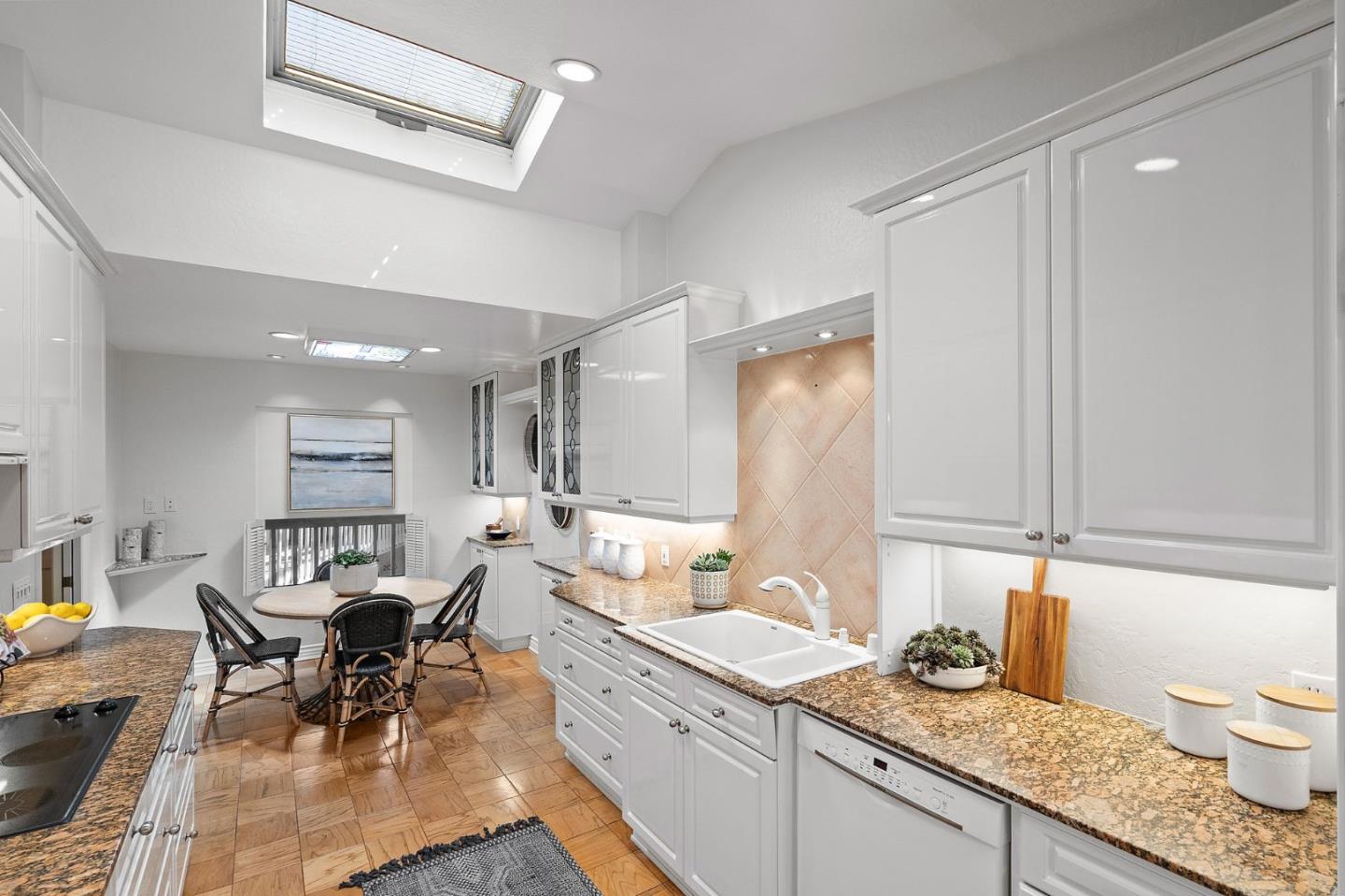 300 Sand Hill Circle, Unit 303 Menlo Park, CA 94025 - Photo 11 of 33 a living room with granite countertop lots of white furniture and a dining table