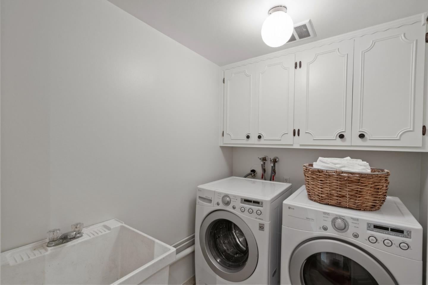 300 Sand Hill Circle, Unit 303 Menlo Park, CA 94025 - Photo 12 of 33 a utility room with dryer and washer