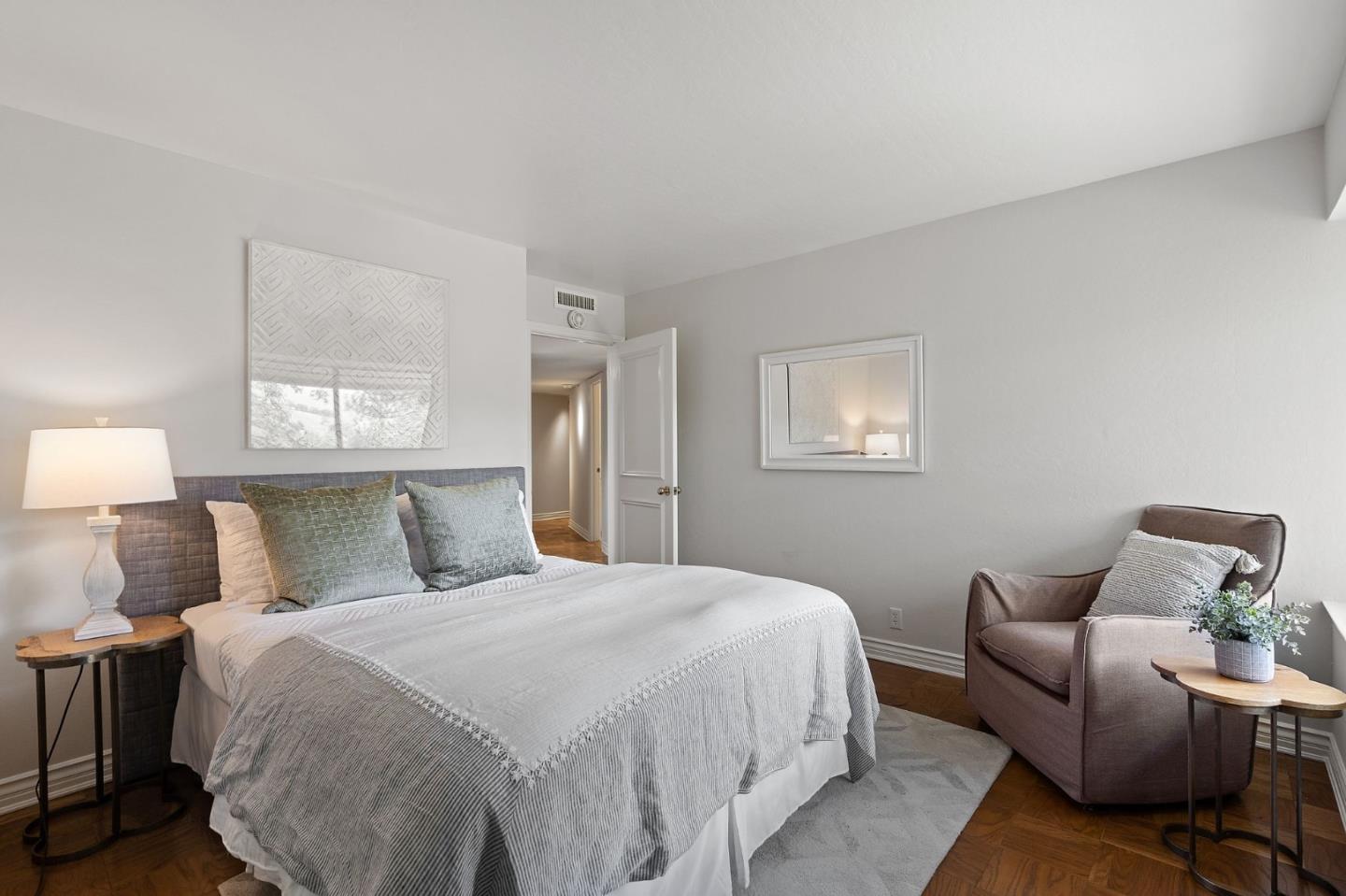 300 Sand Hill Circle, Unit 303 Menlo Park, CA 94025 - Photo 18 of 33 a bedroom with a bed and window