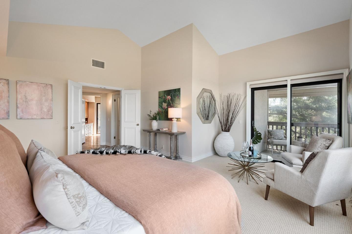 300 Sand Hill Circle, Unit 303 Menlo Park, CA 94025 - Photo 21 of 33 a bedroom with bed and a large mirror