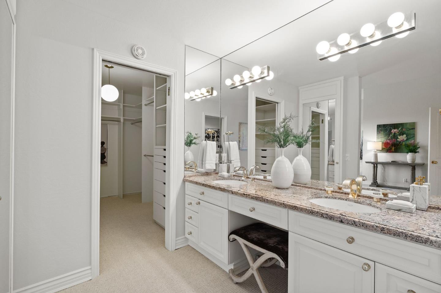 300 Sand Hill Circle, Unit 303 Menlo Park, CA 94025 - Photo 22 of 33 a bathroom with a granite countertop sink and a mirror