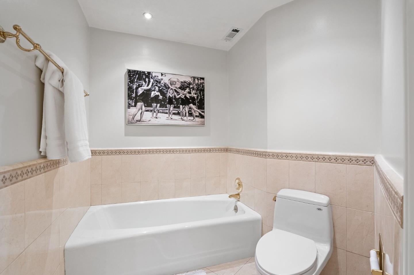 300 Sand Hill Circle, Unit 303 Menlo Park, CA 94025 - Photo 25 of 33 a bathroom with a toilet a sink and bathtub