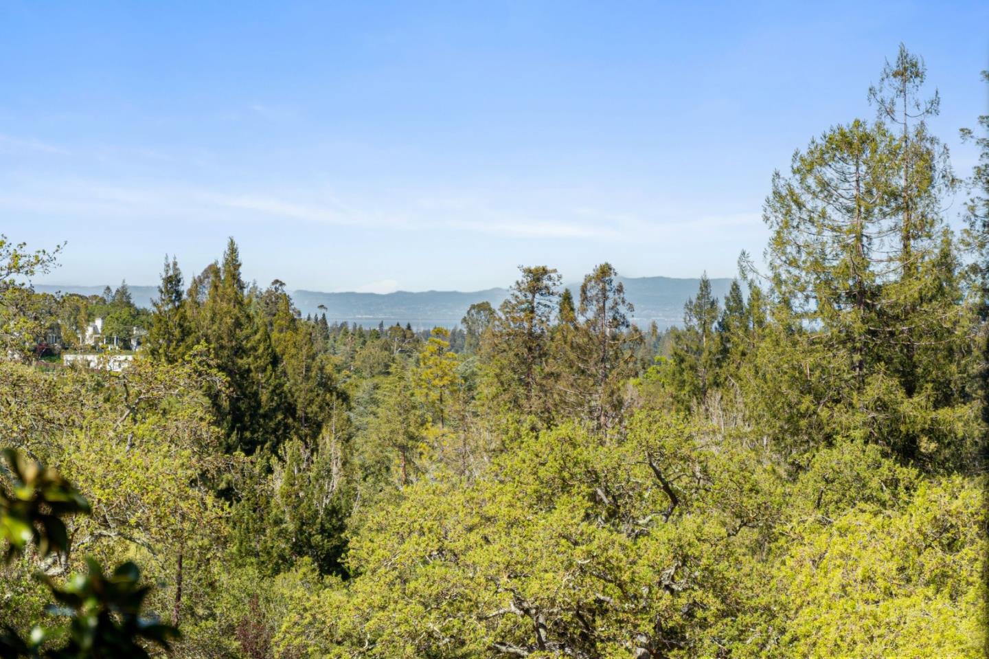 300 Sand Hill Circle, Unit 303 Menlo Park, CA 94025 - Photo 29 of 33 a view of a large building with a mountain in the background