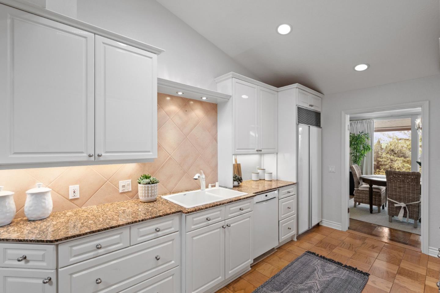 300 Sand Hill Circle, Unit 303 Menlo Park, CA 94025 - Photo 8 of 33 a spacious bathroom with a granite countertop sink and a mirror