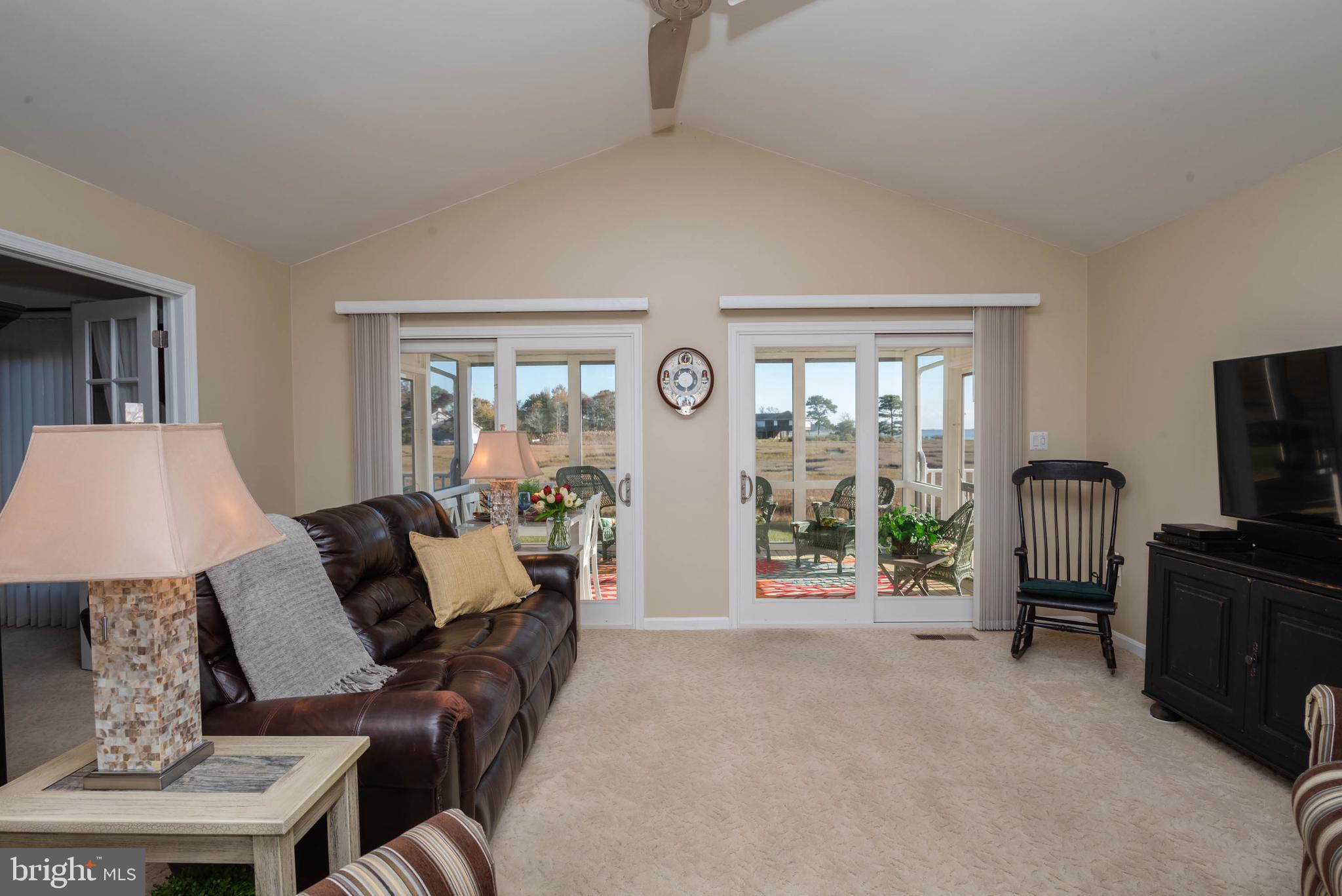 11501 Terrapin Point Road Berlin, MD 21811 - Photo 33 of 94 Living area leads to screened porch!