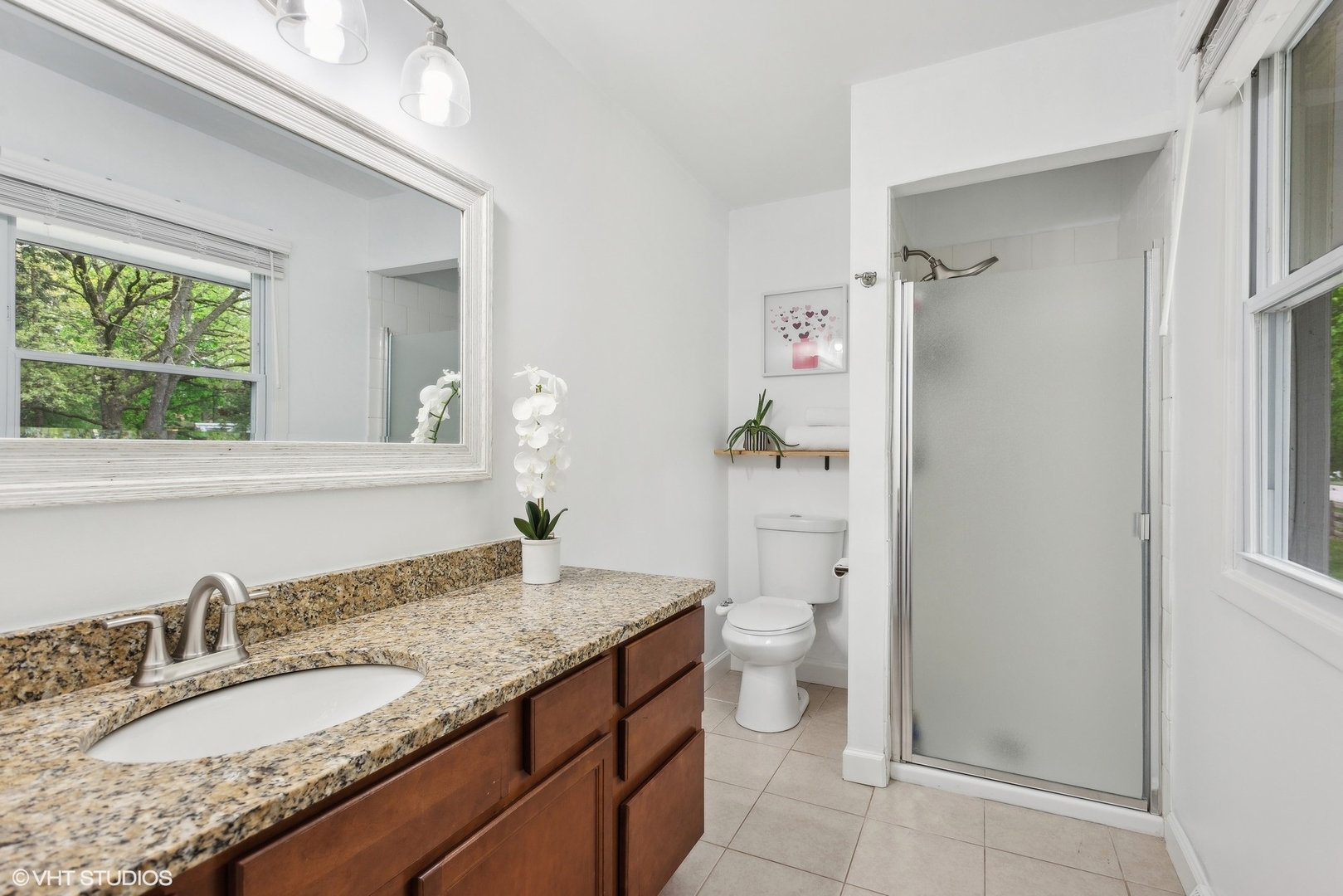 3N488 Ridge Drive St. Charles, IL 60175 - Photo 24 of 25 a bathroom with a granite countertop sink toilet and shower